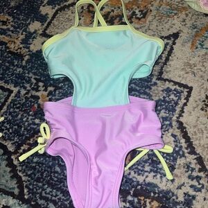 Car & Jack green & purple one piece cut out swim suit. 12 mo. VGUC.